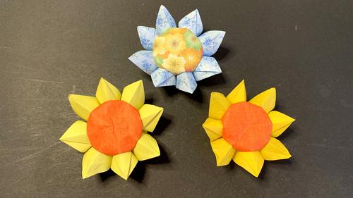 一朵非常漂亮的太阳花也就是向日葵折纸教程很简单哦