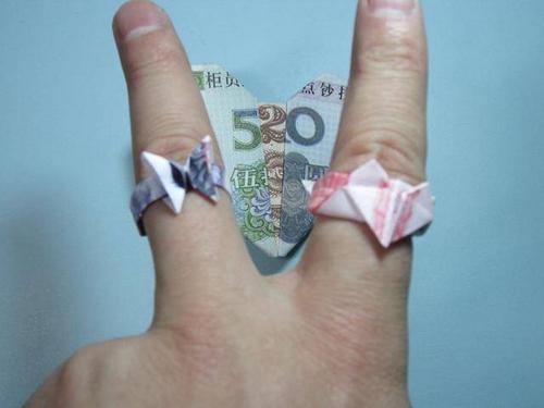 用钱折纸戒指 如何用人民币折纸爱心戒指详细图解